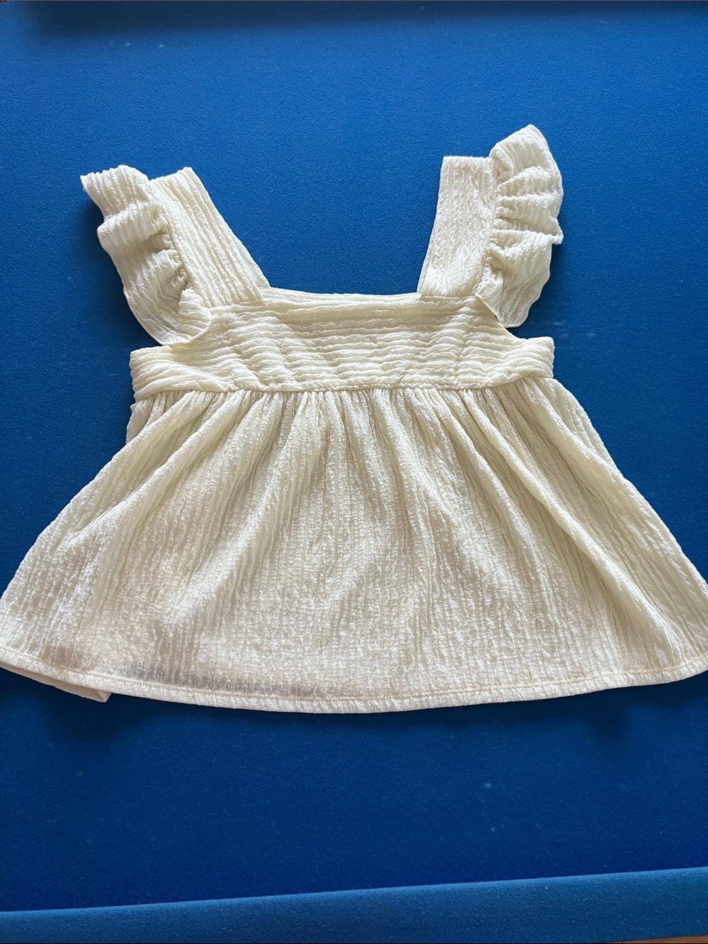 BUCKETLIST Cream Ruffle Strap Tank Top